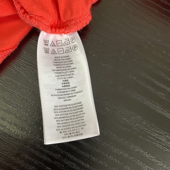 Michael by Michael Kors orange short sleeves top with gold zippers. - Picture 6 of 6